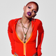 Slick Woods, wearing Fenty Puma by Rihanna bodysuit, shorts, pants and sneakers. Stylist: Jillian Davison